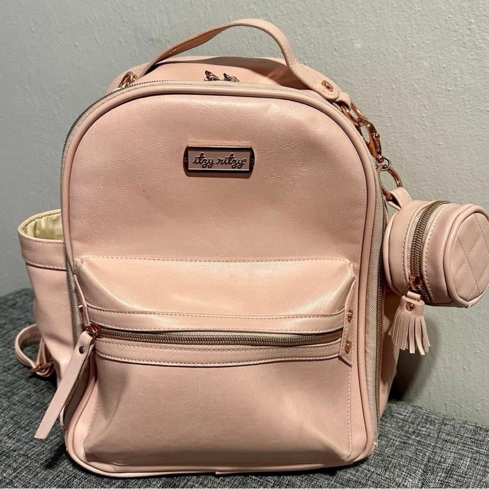 Itzy Ritzy mini diaper bag and charm pod
